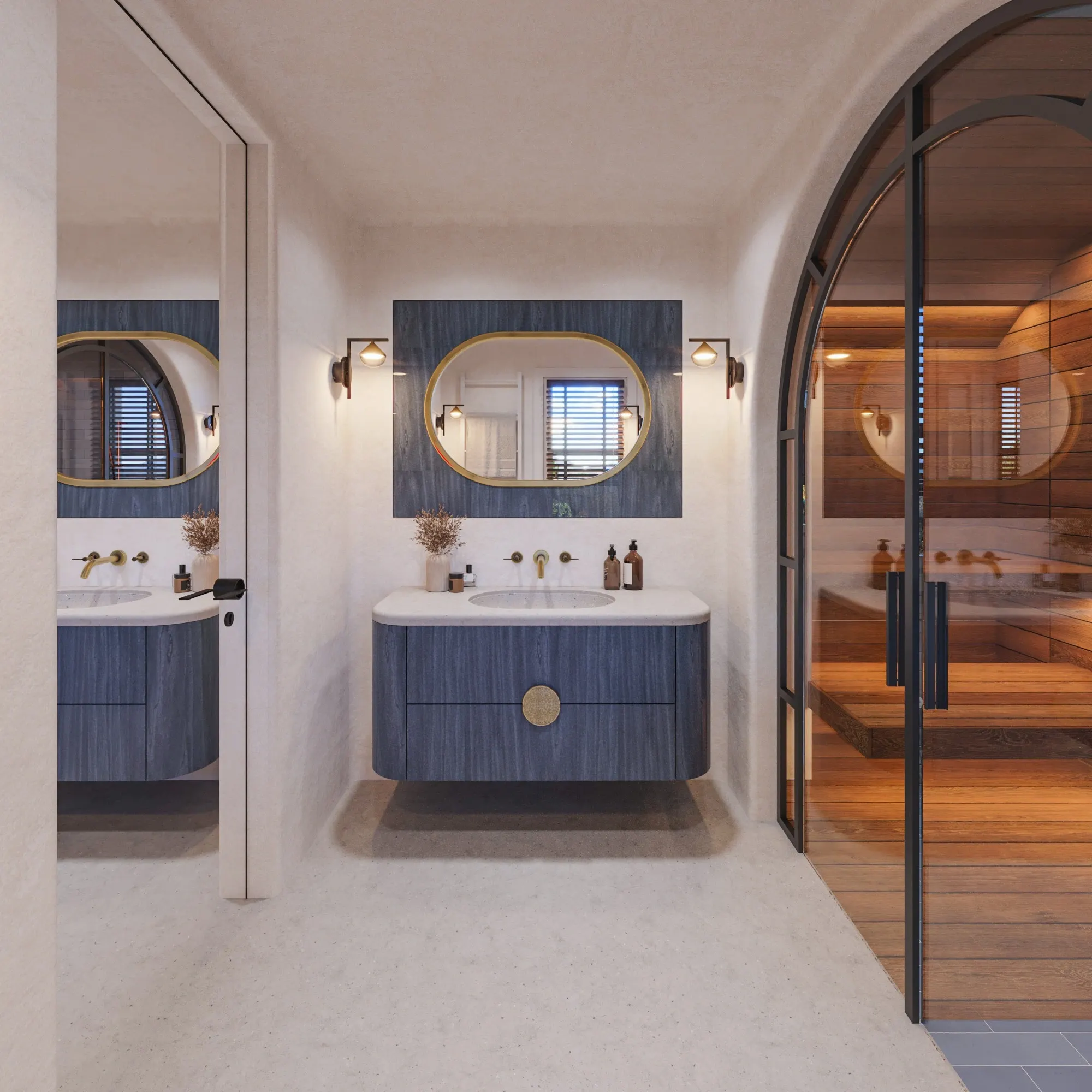 Vanity detail with a blue cabinet, round mirror and wall lights.